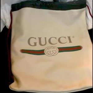 Gucci logo print drawstring backpack in white.